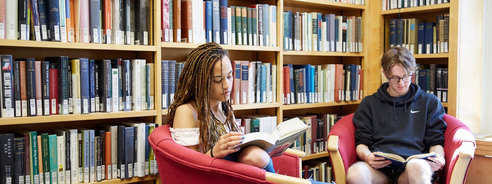 Student reading in College Library