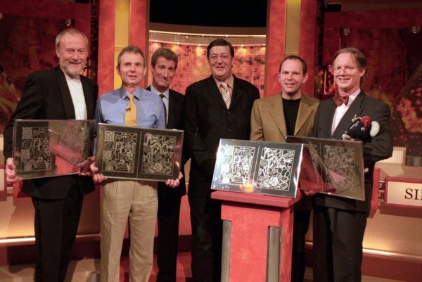 Sidney’s team with their prizes after winning the ‘Reunited show’ alongside Stephen Fry and host Jeremy Paxman 